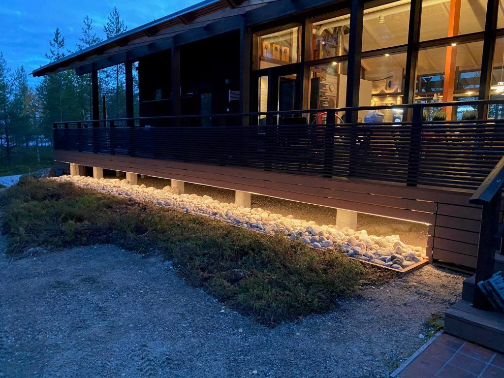 The courtyard is illuminated by indirect light reflected through white paving, using a 7.2 W-m 3000K LED strip and a low profile surface, copyright LedStore